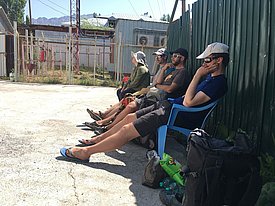 Pascal Buri, Evan Miles and Marin Kneib in Jirgatol, relaxing while the cars are being organized. Photo: A. Jouberton