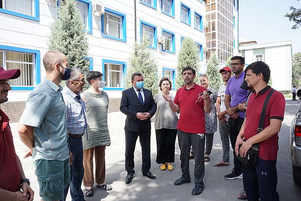 The team all looking at Daler, the young tajik interpreter working at the GRC, as he translated the fare-well words of the president of the Tajik Academy of Sciences, who sent us on our way with good wishes to study their glaciers. Photo: A. Jouberton